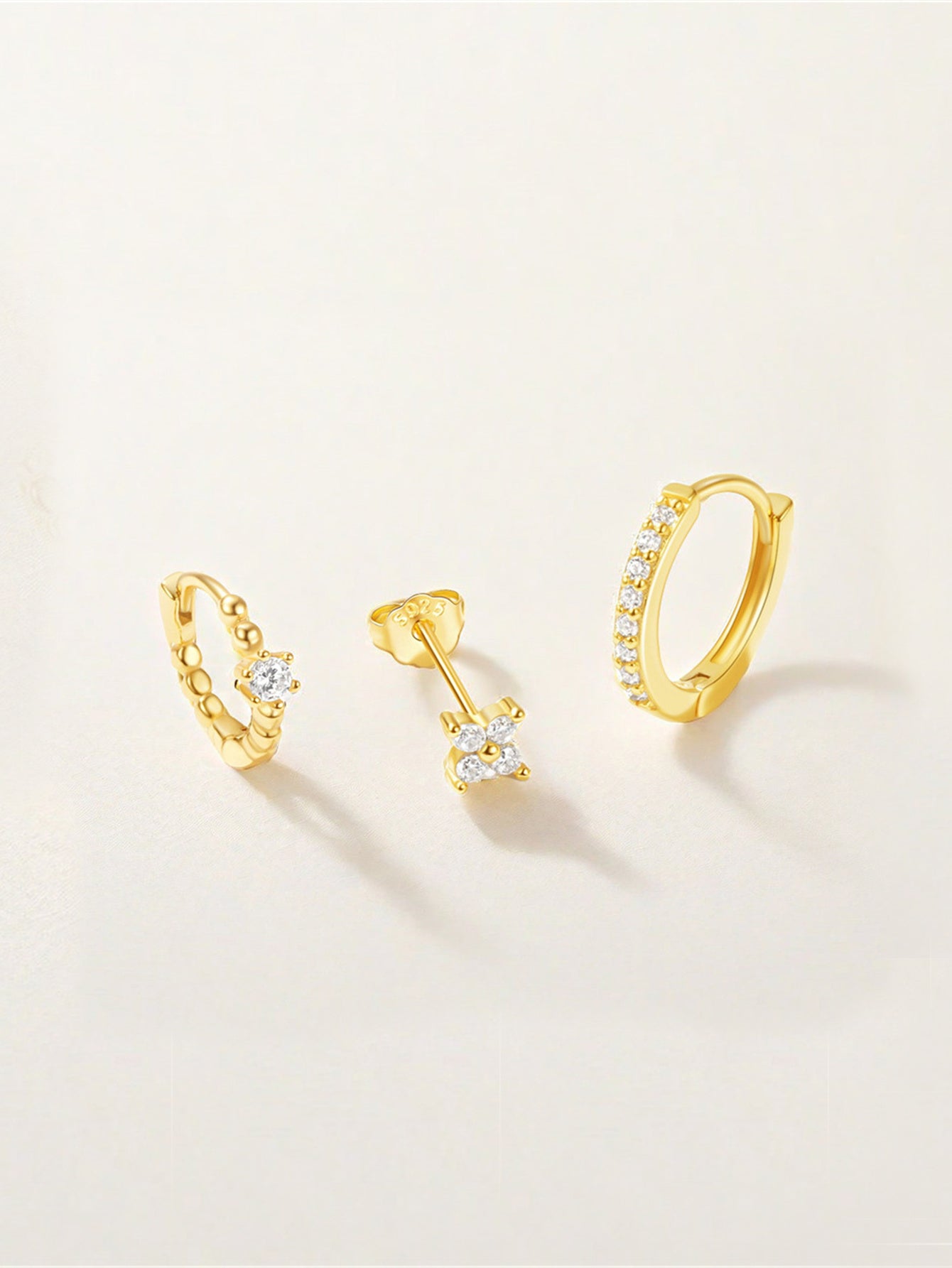 Luisa – Orecchini in oro dalla struttura femminile.