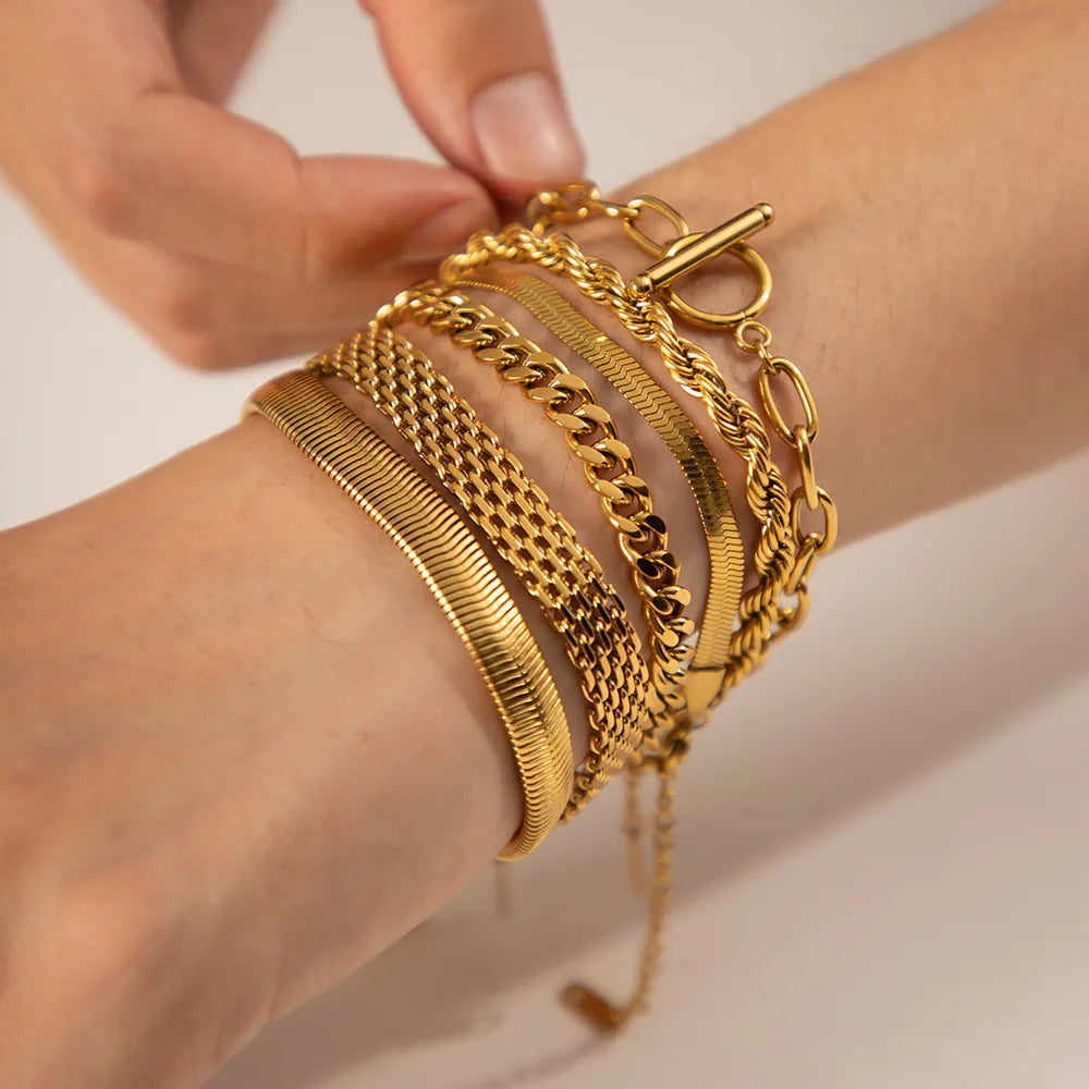 Tereza – Bracciale in oro con effetto doppia catena.