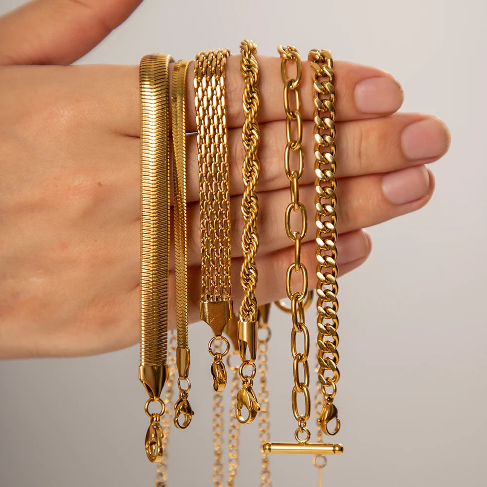 Tereza – Bracciale in oro con effetto doppia catena.