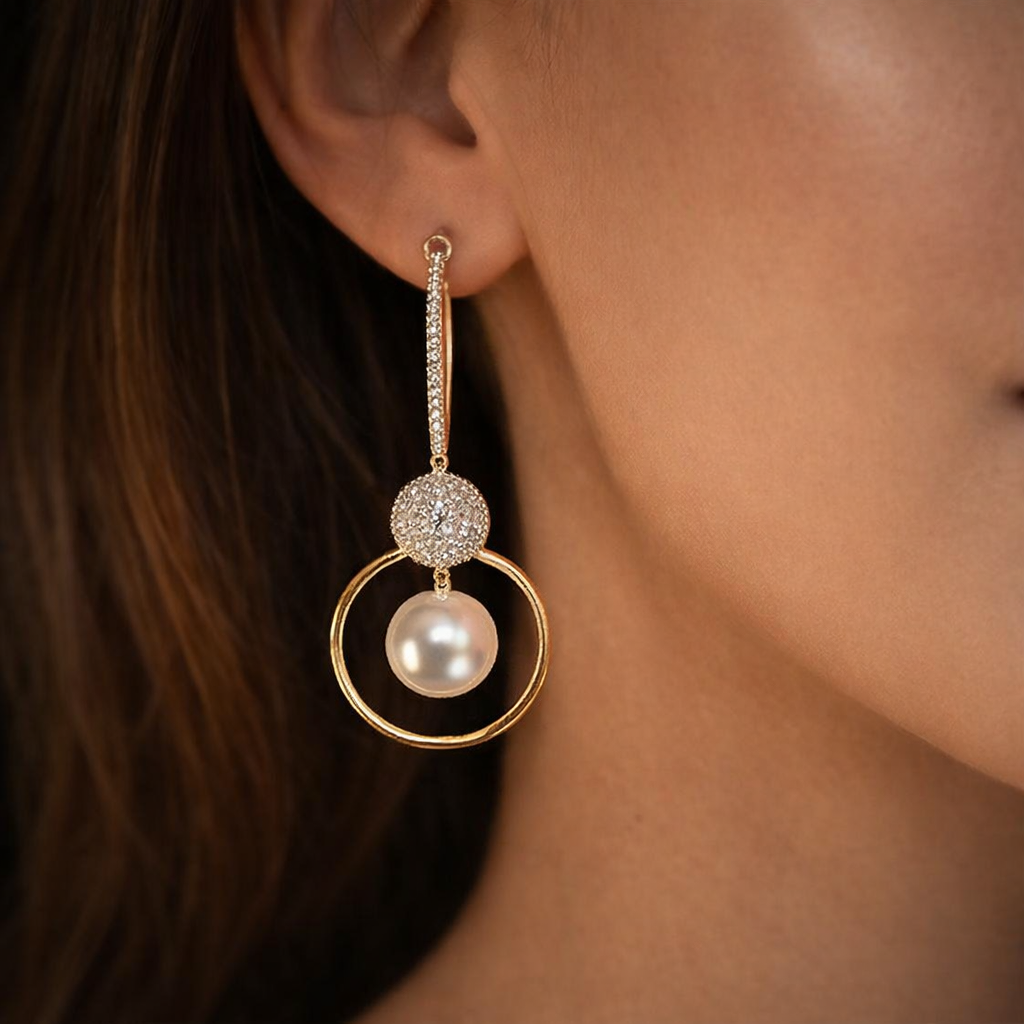 Charlotte – Orecchini dorati con forma a goccia trasparente