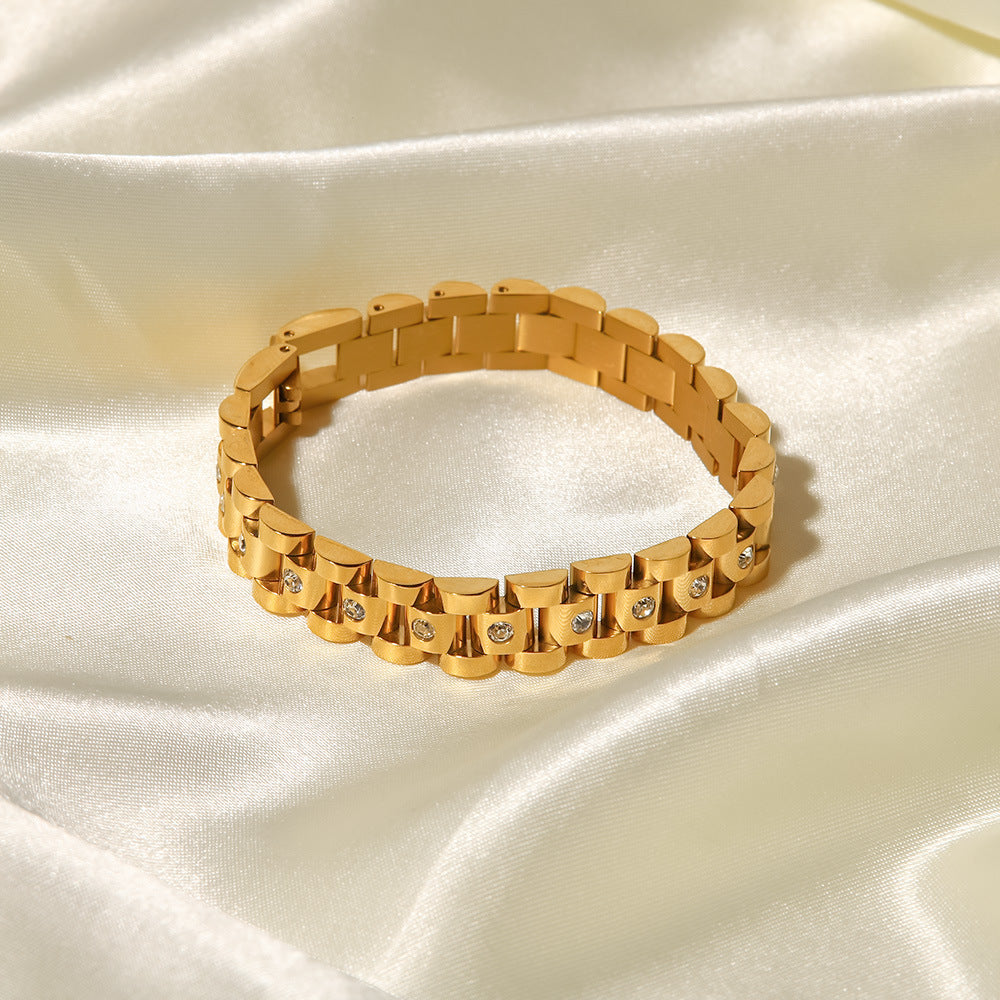 Amira – Bracciale in oro con struttura a maglie grezze.