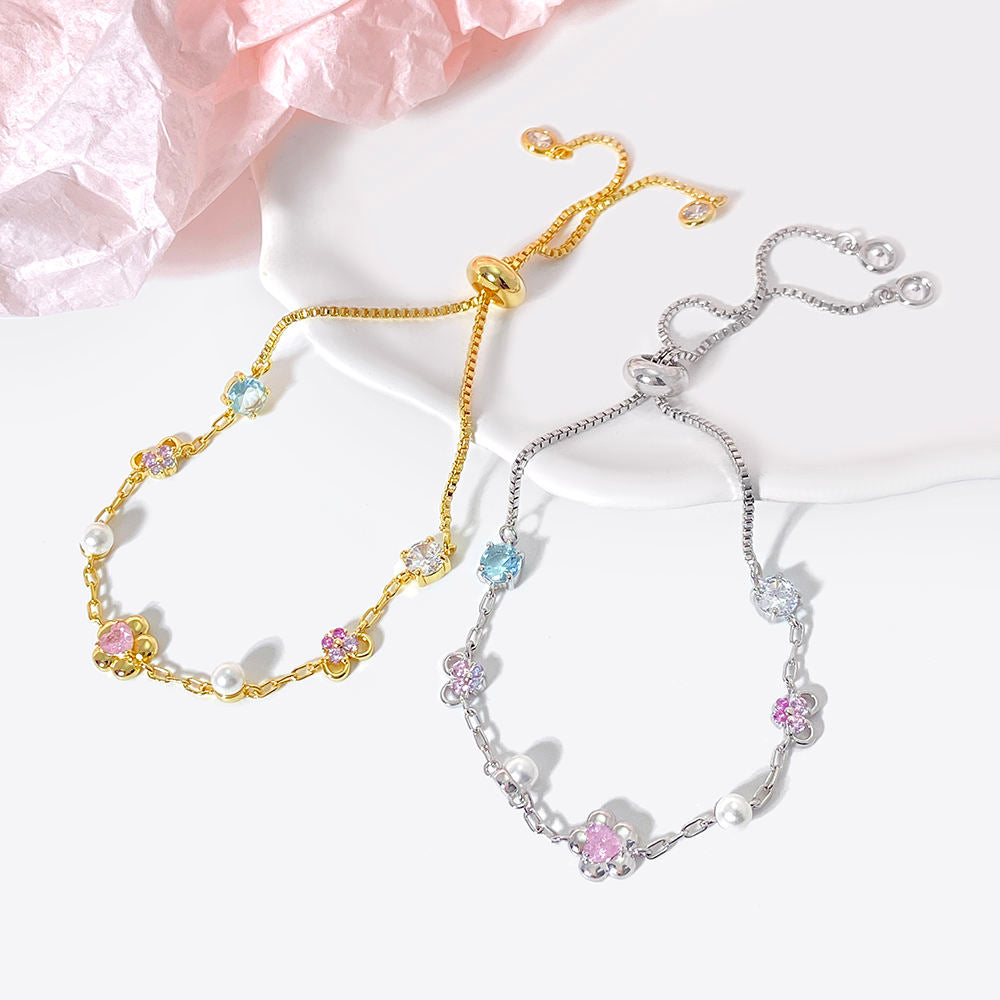 Dorota – Orecchini scultorei in oro con terminali in perle.