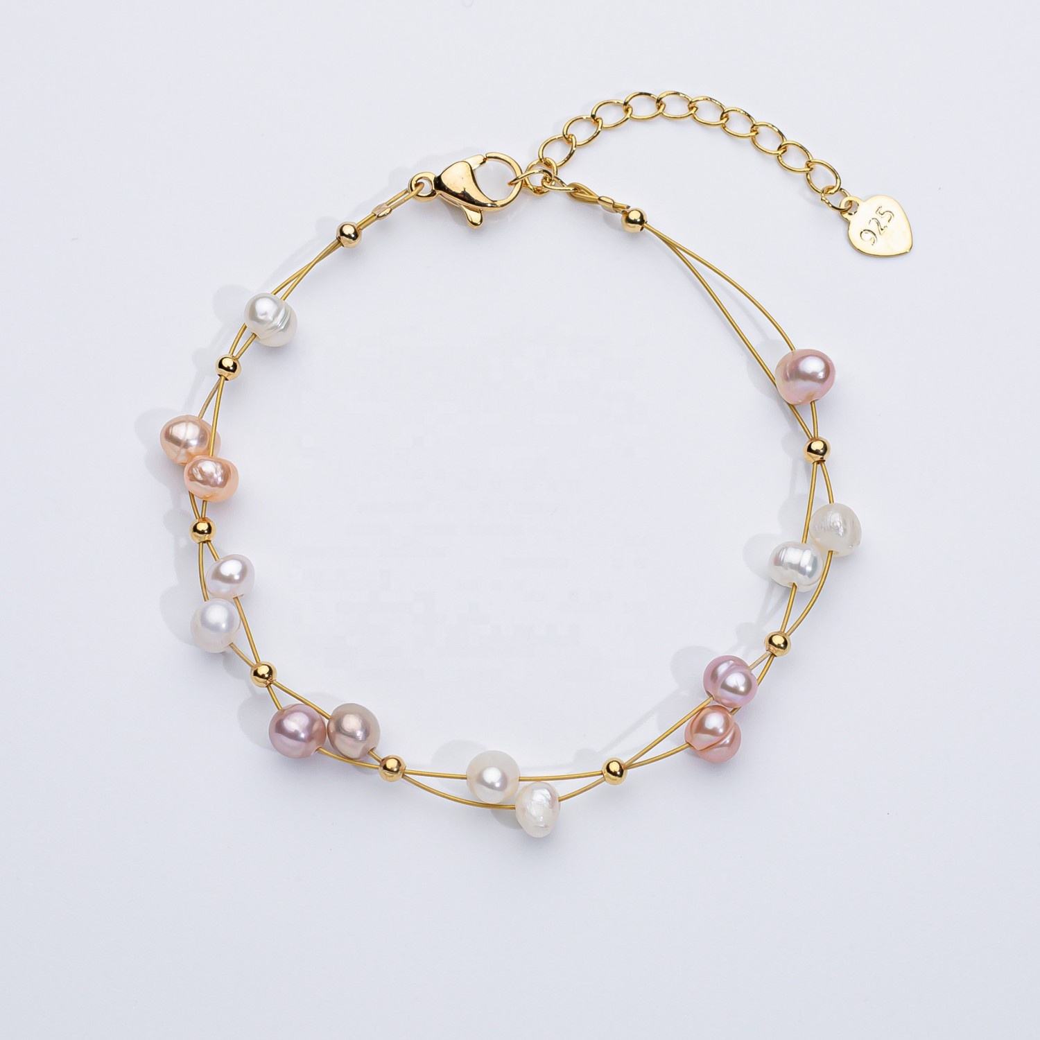 Marlena – Bracciale in oro con dettagli di perle.