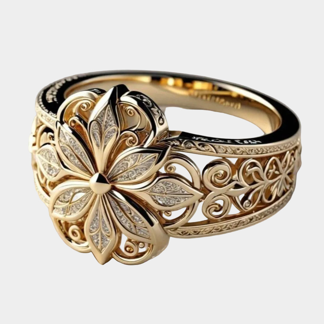 Daniela – Anello in oro con motivo floreale esotico in zircone