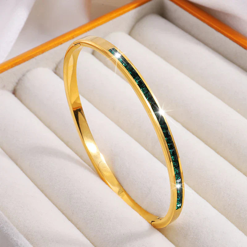 Leonora – Bracciale placcato oro con smeraldi.