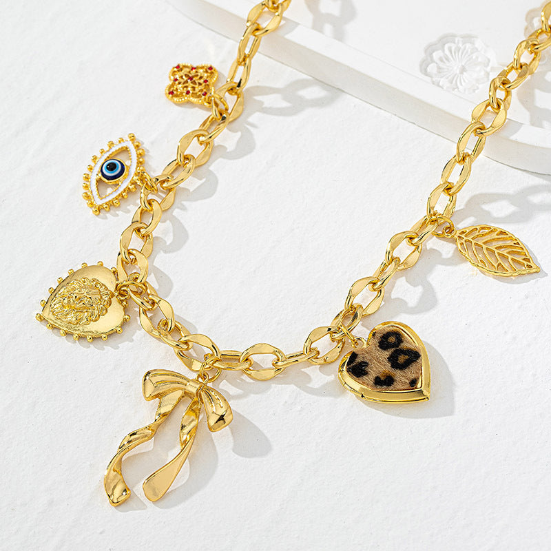 Lena – Collana dorata con dettagli in pietra