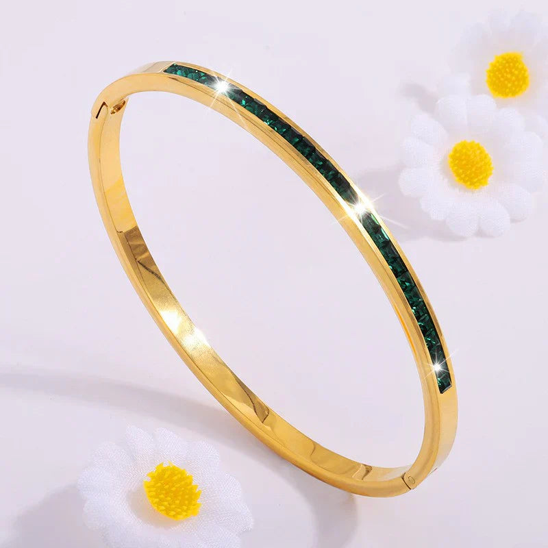 Leonora – Bracciale placcato oro con smeraldi.