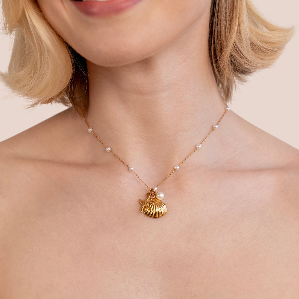 Livia – Collana dorata con pietra a forma di goccia