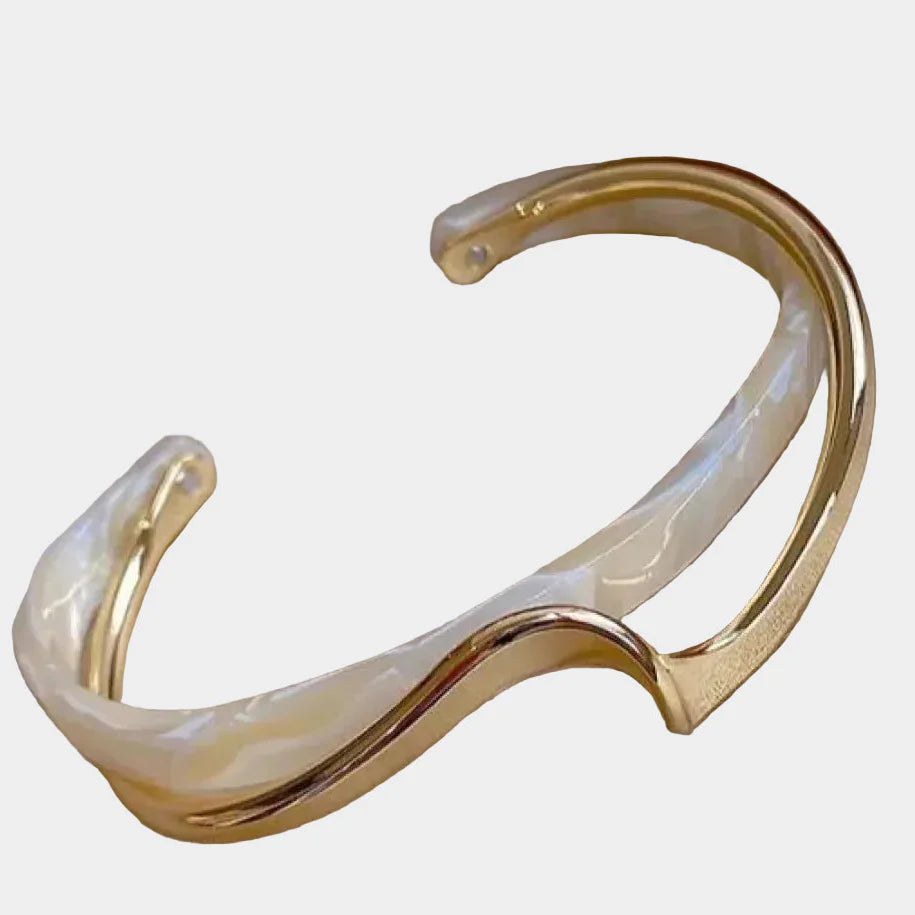 Bracciale dorato elegante con opale bianco