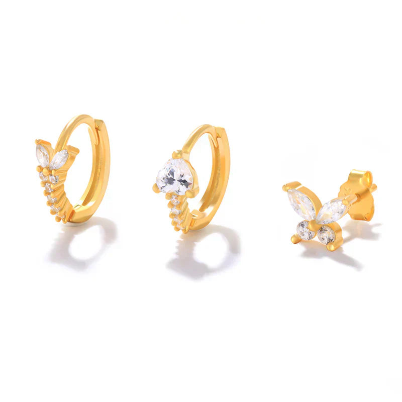 Eva-Marie – Delicati orecchini in oro dalla forma fluida.