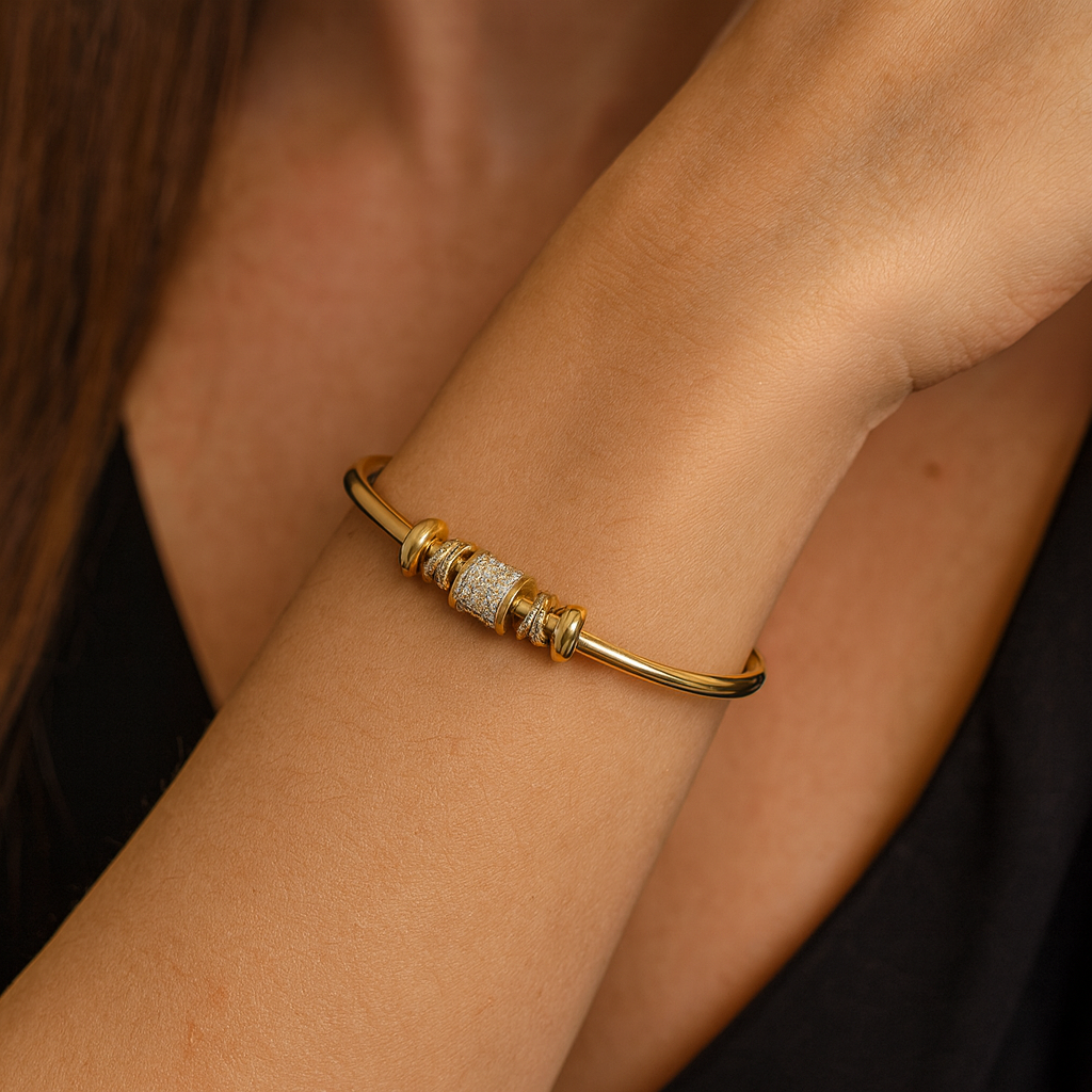 Nina – Bracciale regolabile con charm in oro
