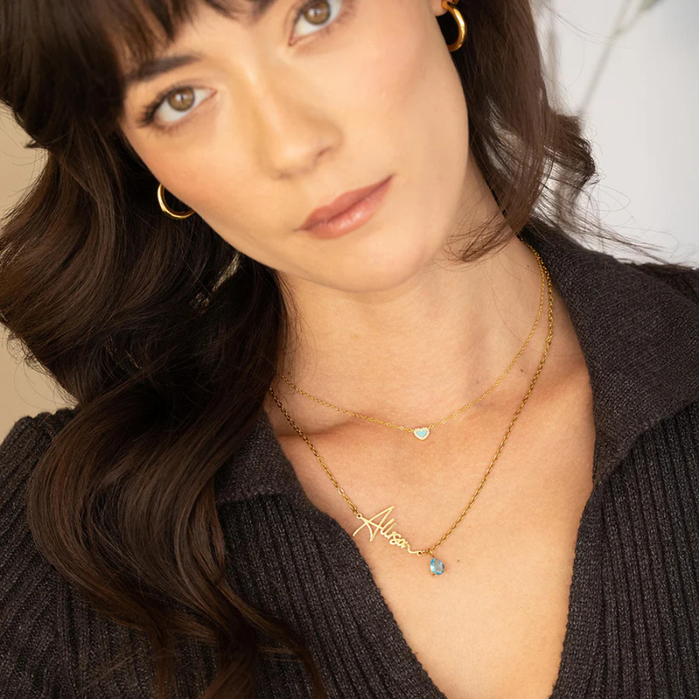 Livia – Collana dorata con pendente turchese