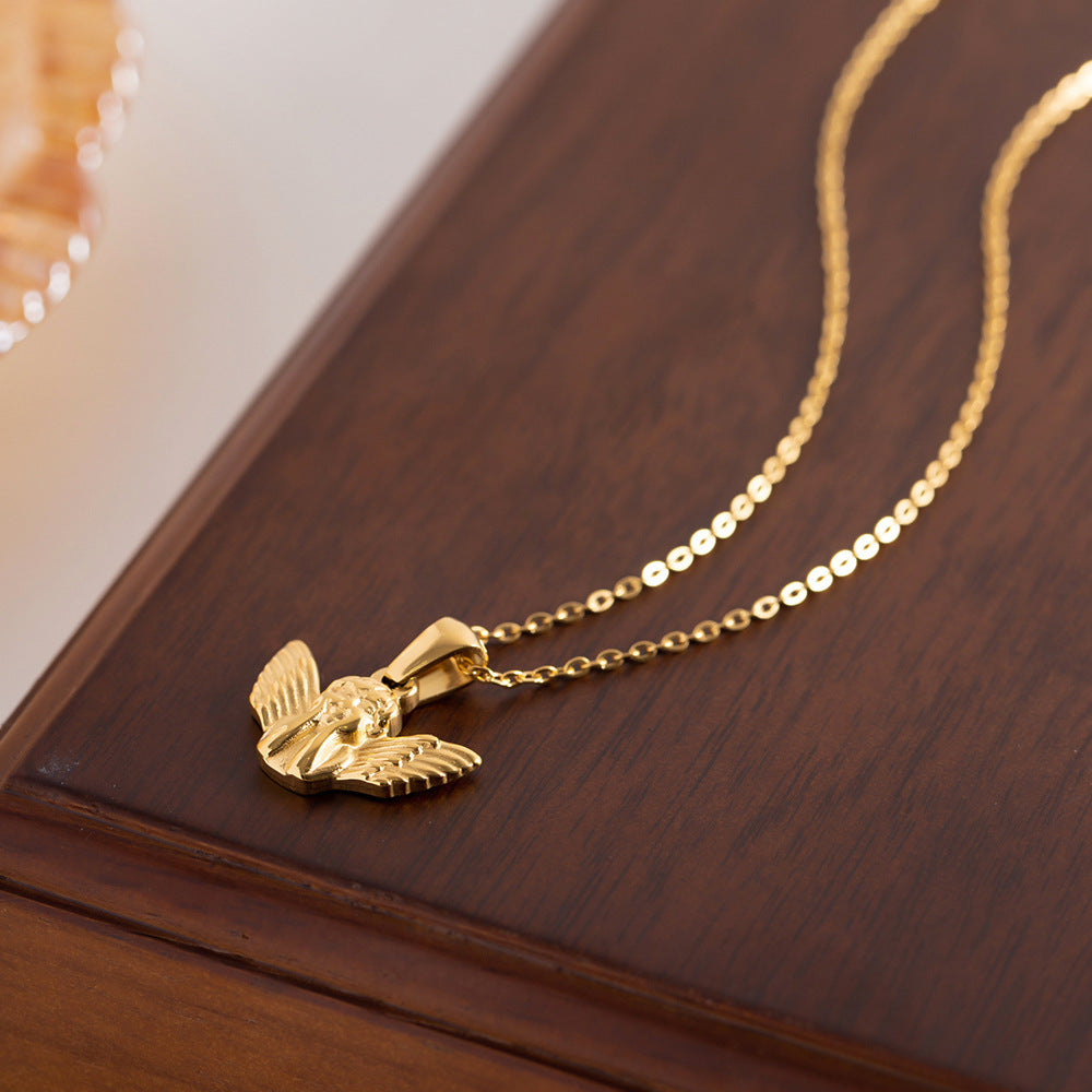 Frieda – Collana dorata con pendente a forma di ala