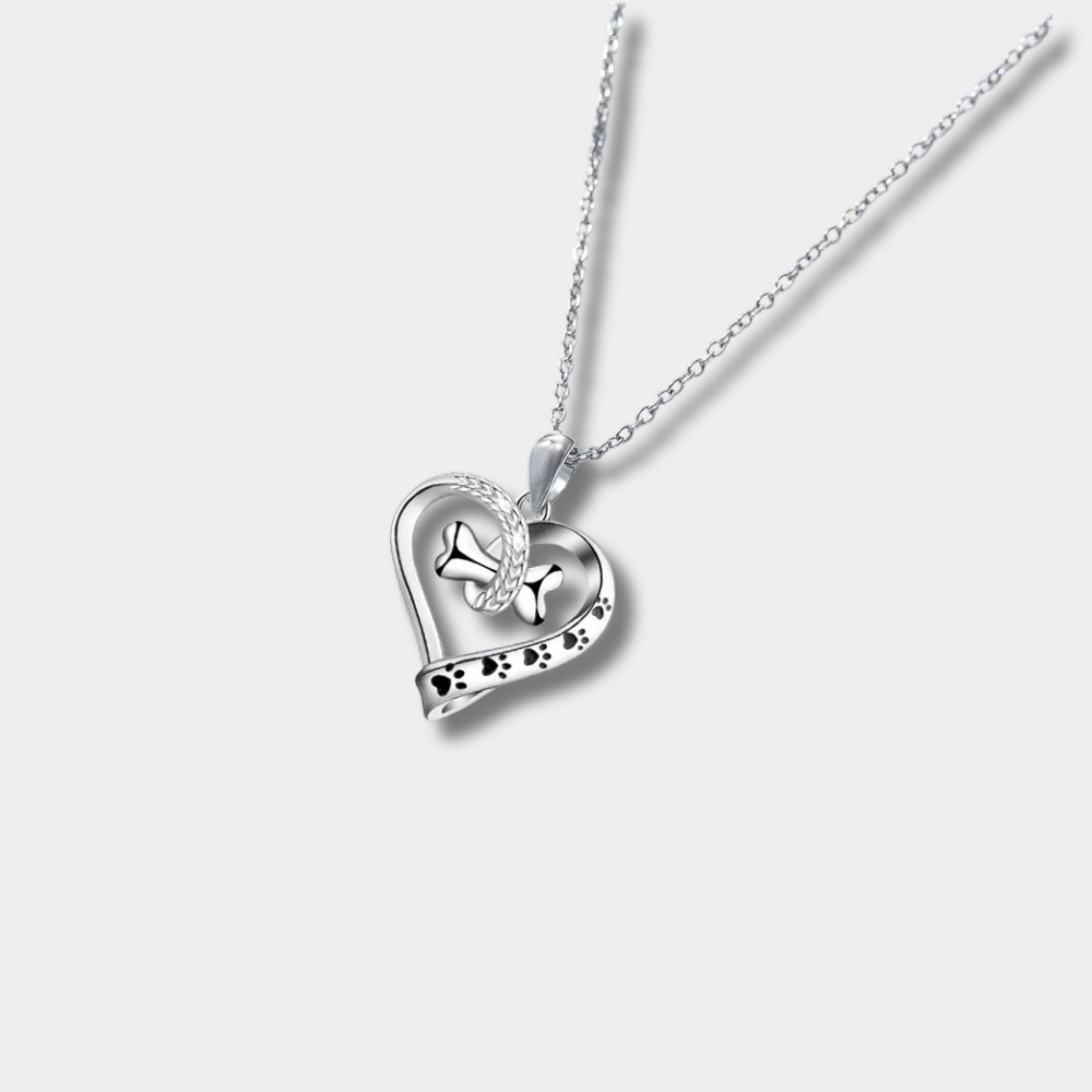 Set di gioielli in 2 pezzi con pendenti a forma di zampa, cuore e osso