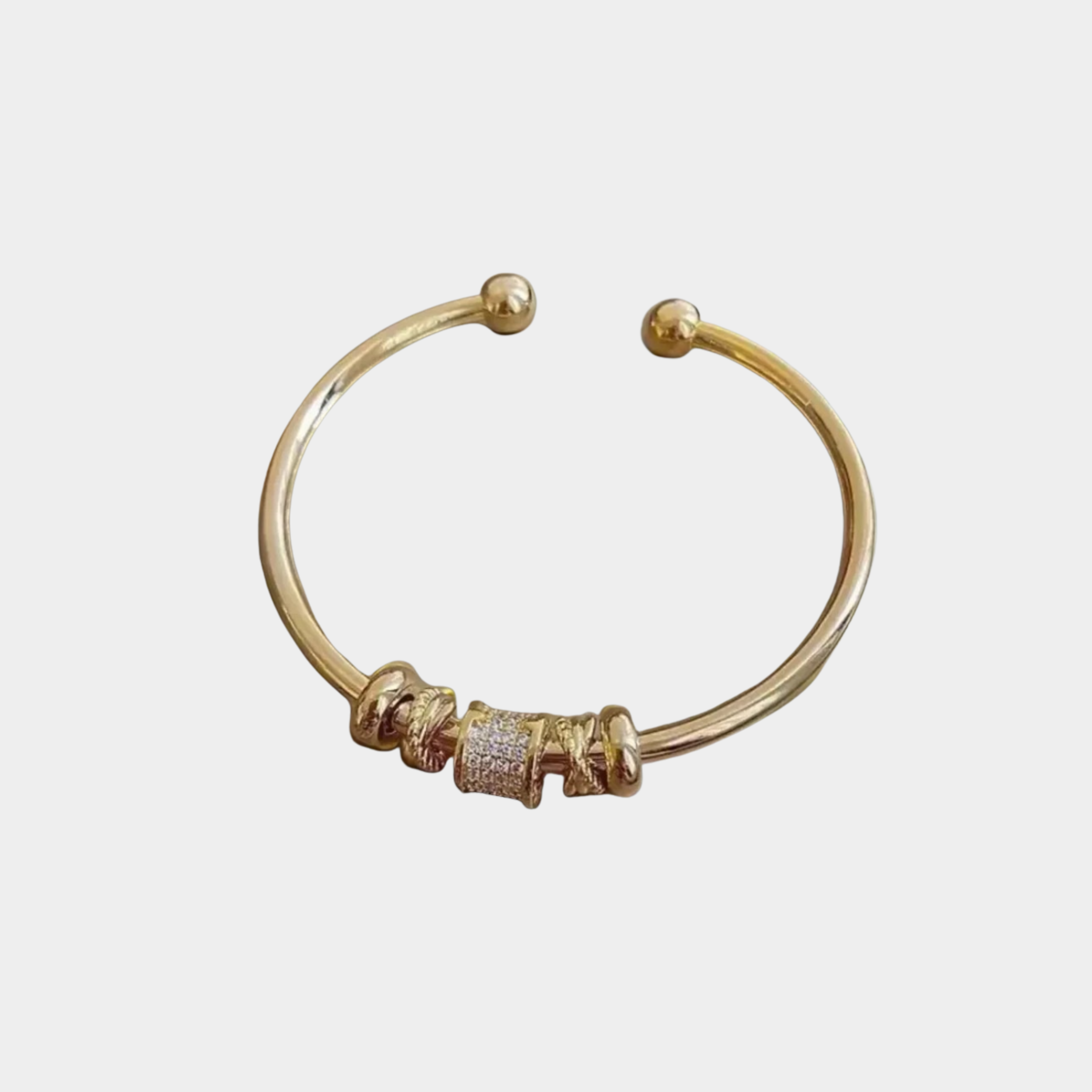 Nina – Bracciale regolabile con charm in oro