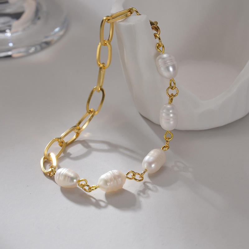 Olivia – Bracciale di perle lucide con cuore.