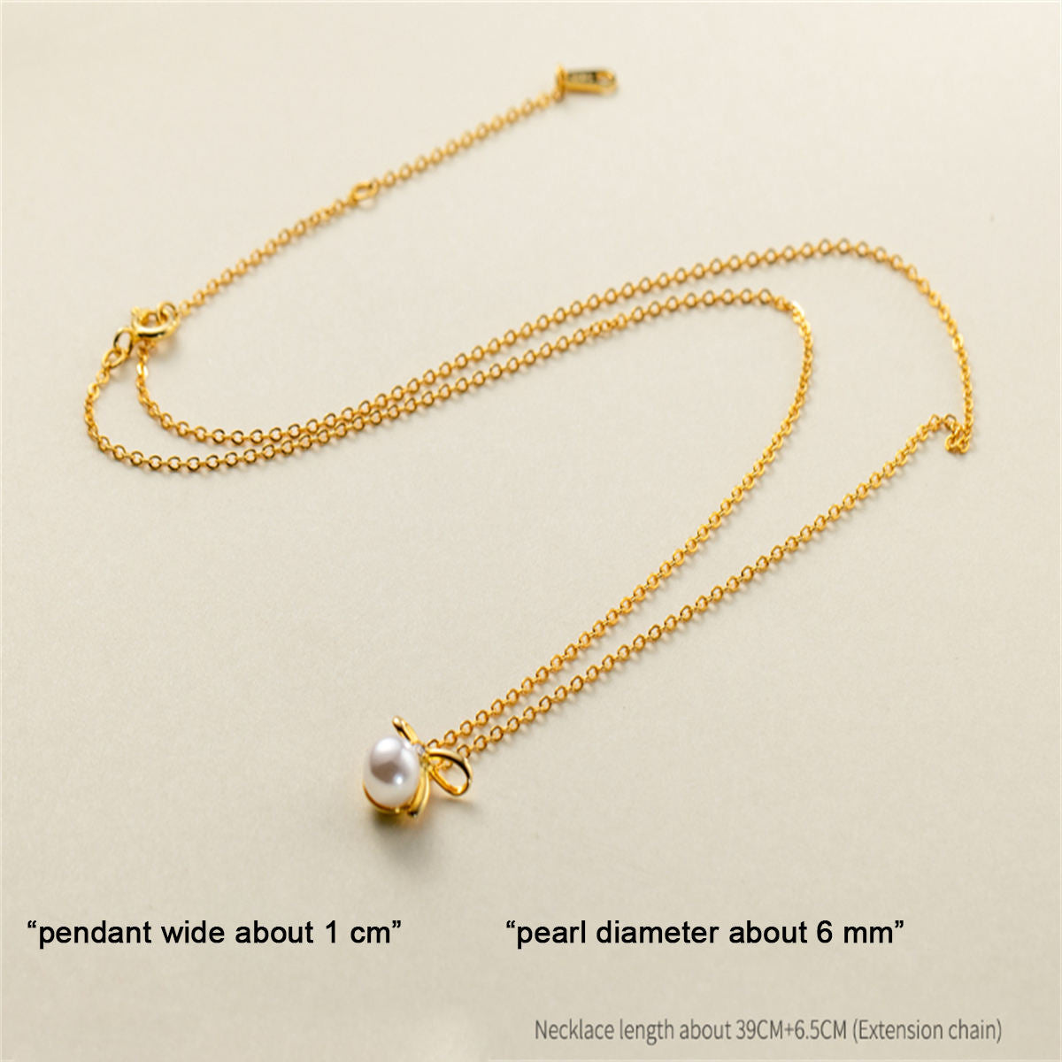 Johana-Luisa – Orecchini in oro con doppia perla.