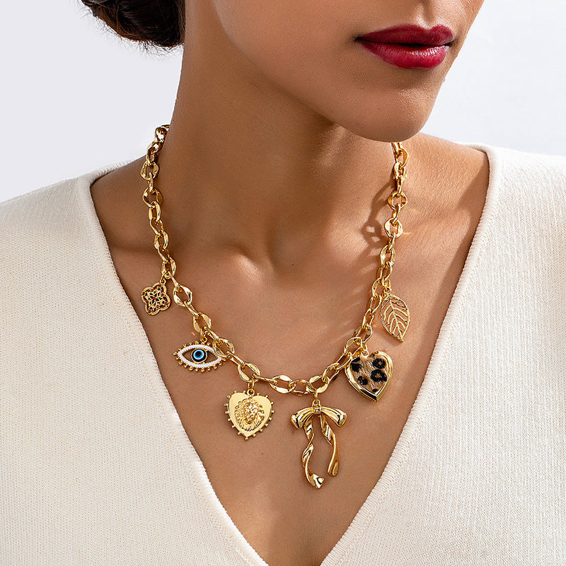 Lena – Collana dorata con dettagli in pietra