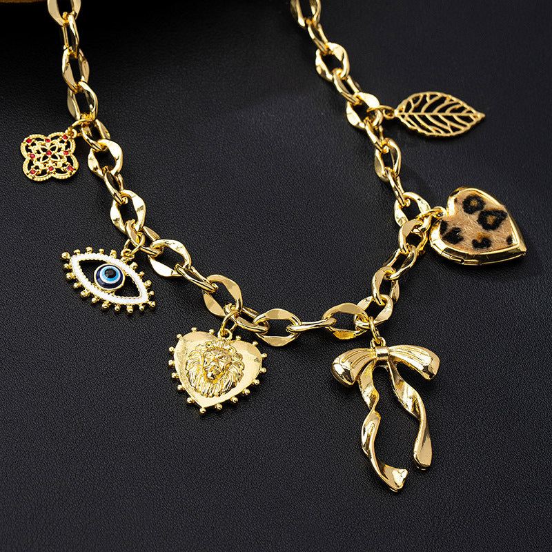 Lena – Collana dorata con dettagli in pietra