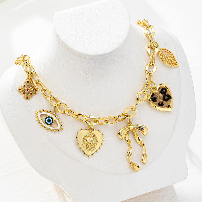 Lena – Collana dorata con dettagli in pietra