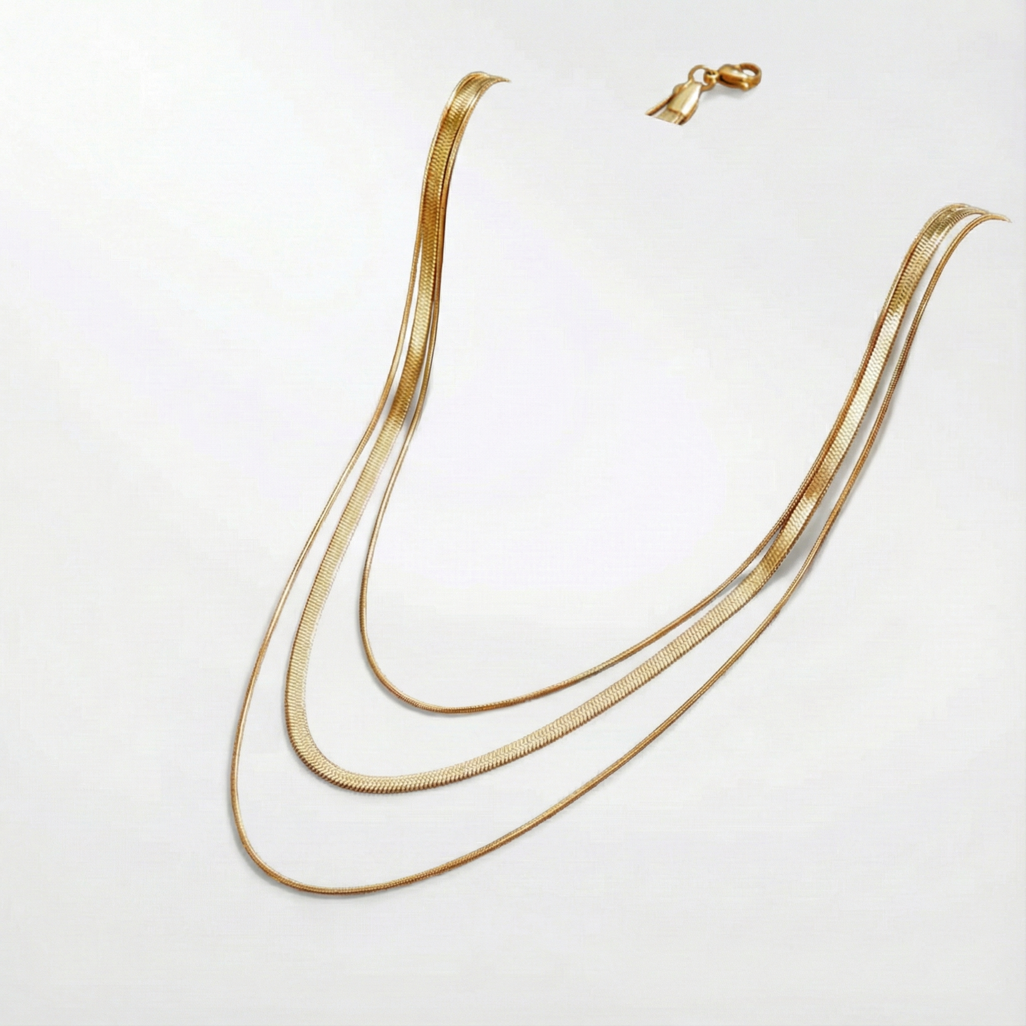 Antonie – Collana in oro multistrato dalla struttura trasparente.