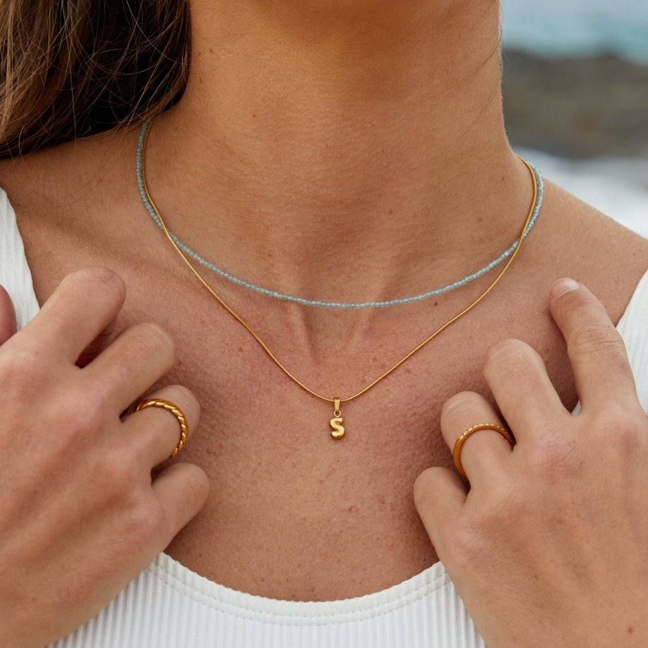 Marlena – Collana dorata con pendente geometrico