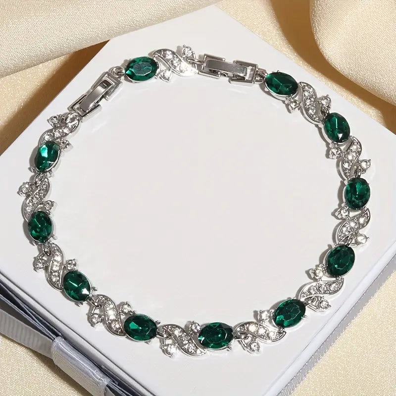 Helena – Bracciale in argento con smeraldi.