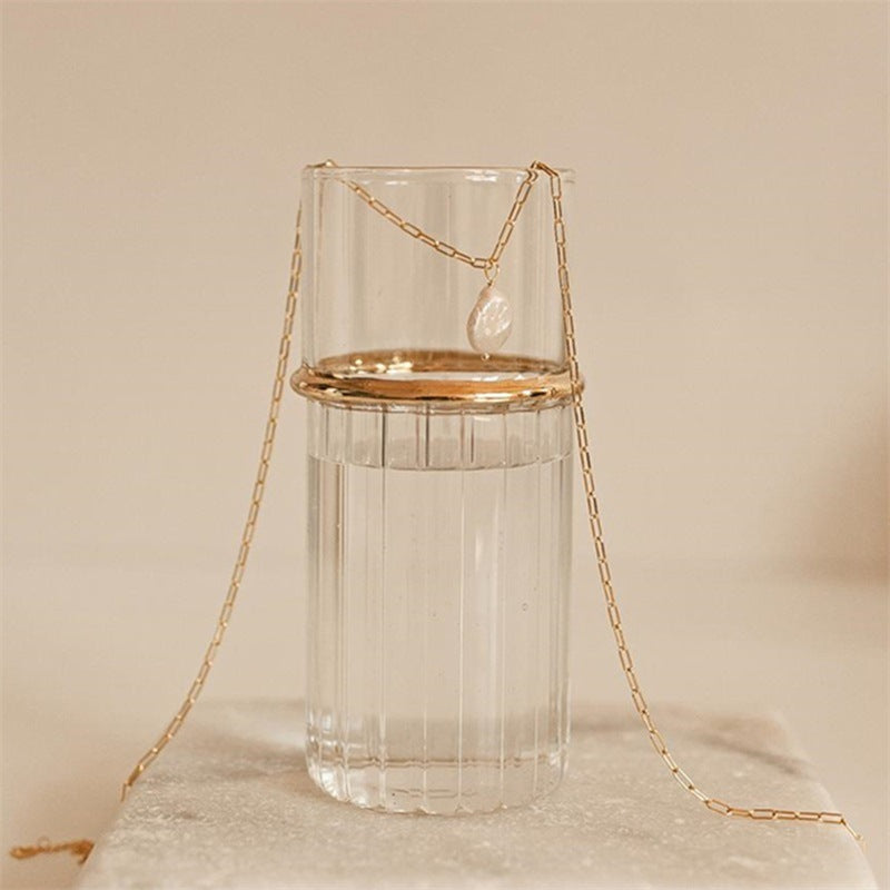 Elisa – Catenina dorata delicata con mini croce