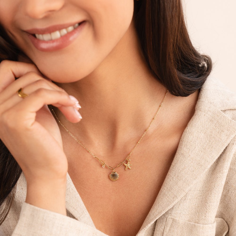 Anja – Collana dorata con decorazione in perla