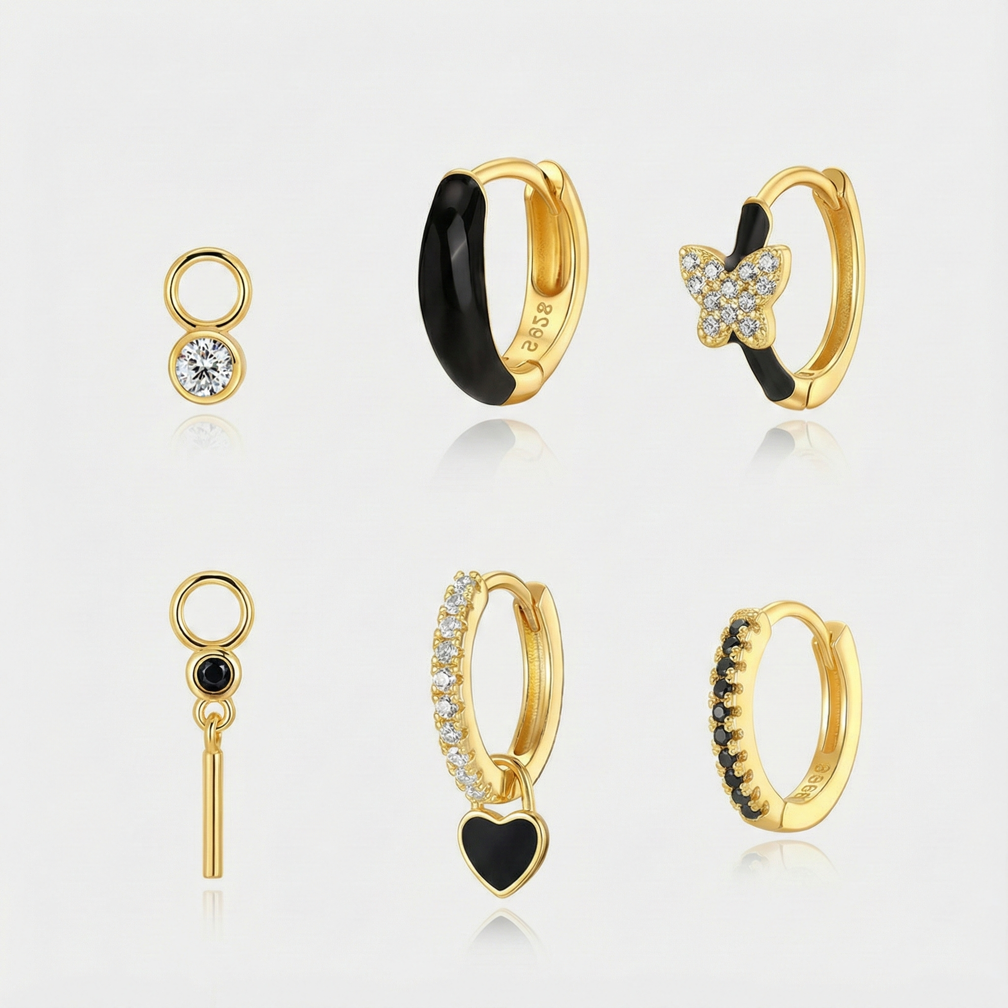 Theresia – Orecchini in oro dalla curva delicata.