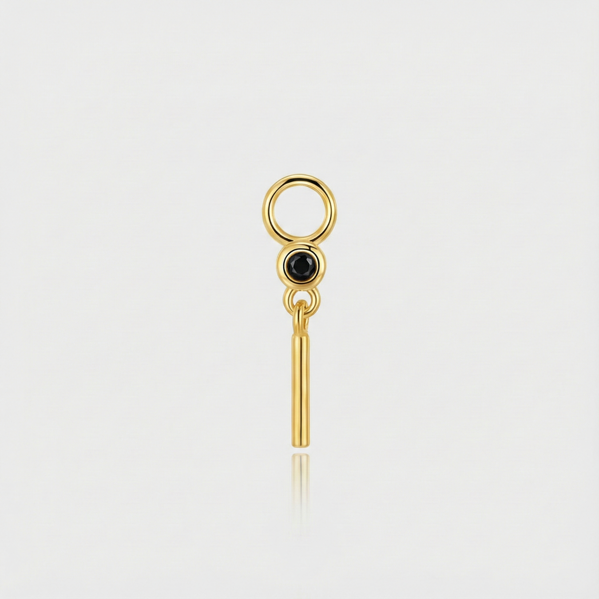 Theresia – Orecchini in oro dalla curva delicata.