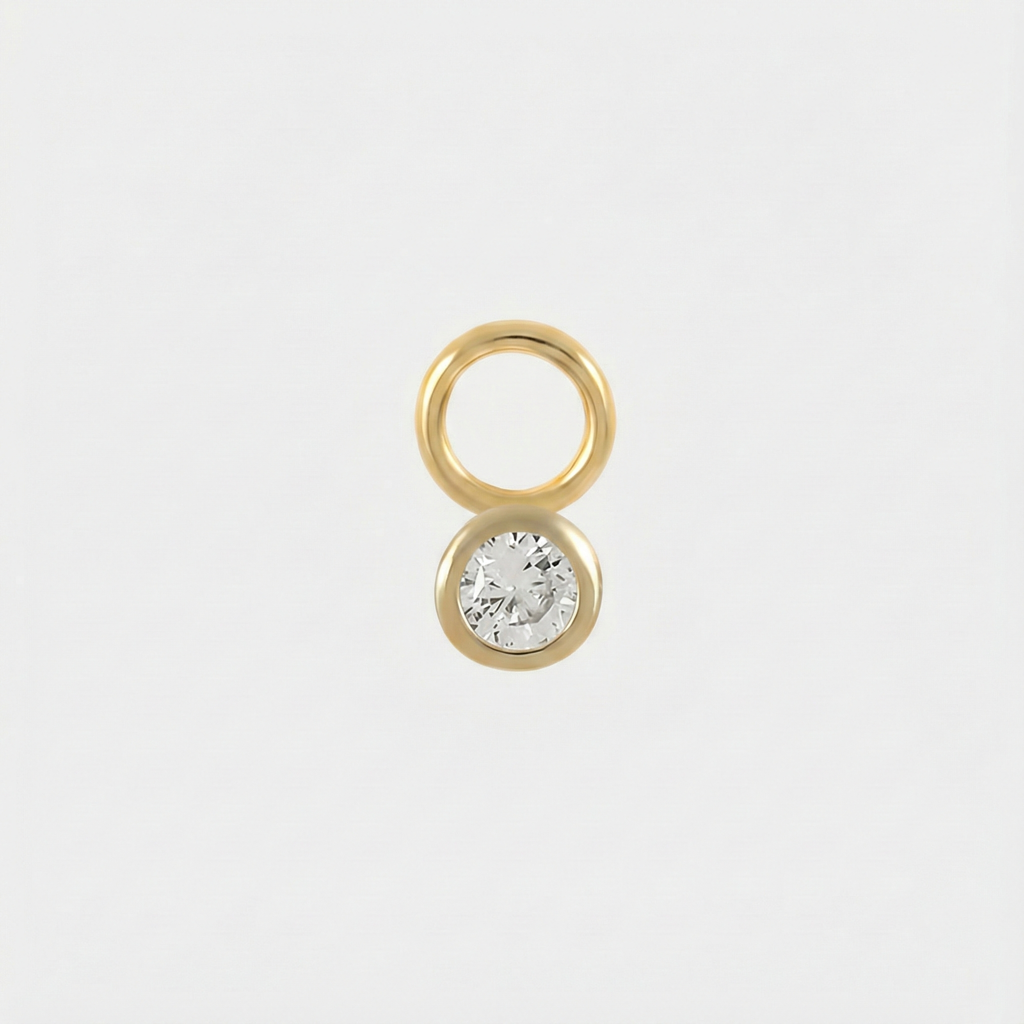 Theresia – Orecchini in oro dalla curva delicata.