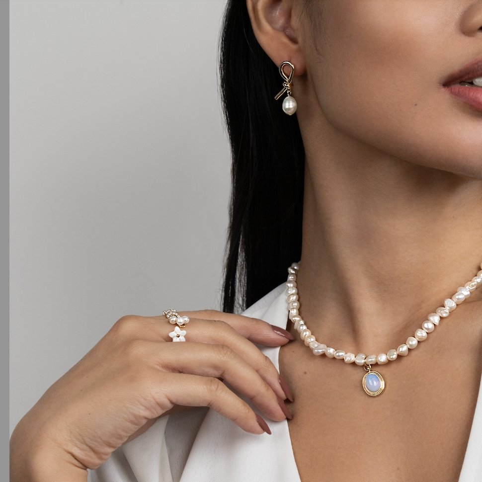 Tereza-Sofie – Orecchini in argento dalla forma curva.